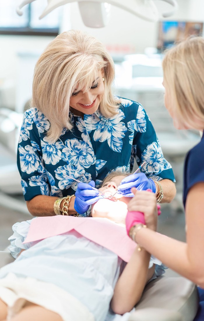 Dr. Moore treating a young patient
